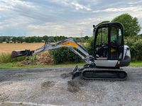 Minibagger JCB 8026 CTS mit ausgestrecktem Ausleger